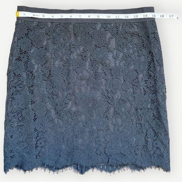 LOFT Black Lace Lined Stretch Waist Asymmetrical Scallop Hem Mini Skirt. 6. - Picture 3 of 7